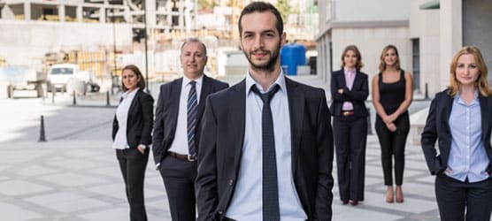  corprate professional standing together